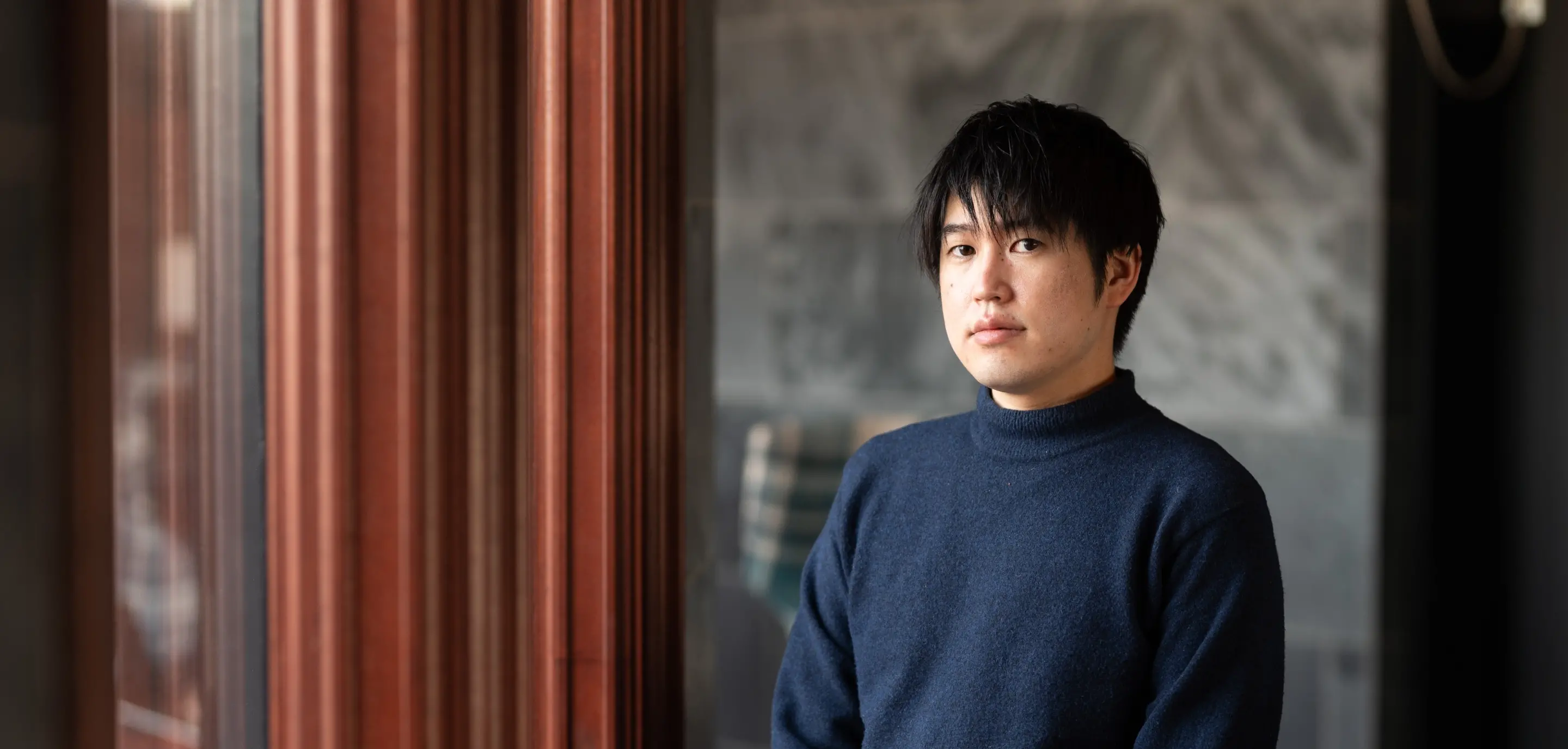 なぜ人の価値が正しく発揮されないのか。世界を相手に勝負し続ける、石崎が描く未来。