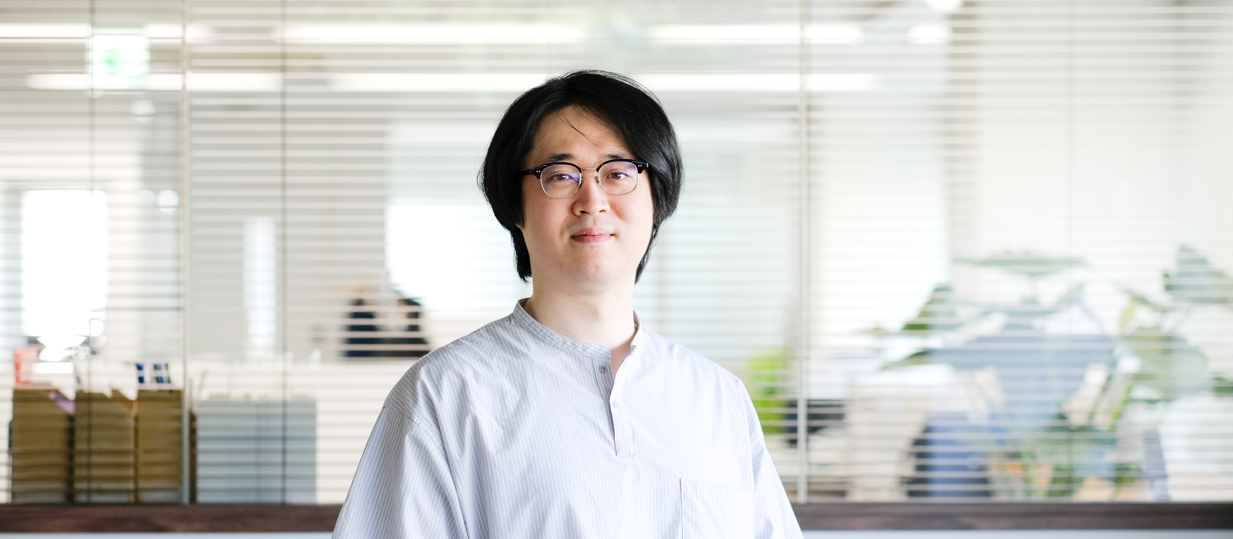 【社員紹介】小説家志望からコーポレートITの頼れる存在へ。失敗から学んで成長したこと