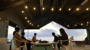 沖縄合宿（2021年）の様子。BBQのほか、社員プレゼン大会の「WIN TED」やフォトコンテスト、沖縄のクライアントとの交流会を行いました。