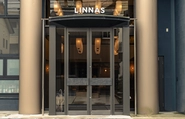 『LINNAS Kanazawa』。元々は美容の専門学校だった建物をリノベーションを経てホテルとして運営している。