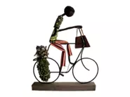  アフリカ雑貨販売をスタートしたきっかけ。自転車マン。ウガンダの工芸品、一つ一つ手作りで個性的な表情も素敵です。