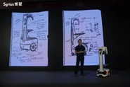 2018年夏天，从北京飞往上海的航班上， 前Google X实验室Project Tango负责人蒋超 在记事簿上勾勒出一台物流AMR草图。 这就是Syrius炬星首款自主移动机器人， FlexComet·小白龙的雏形。