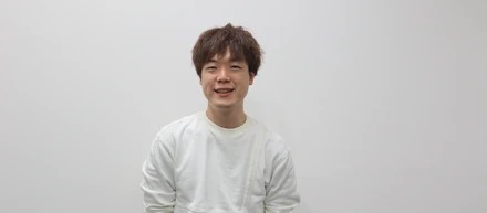 組織を横断すると、一段上の景色が見えてくる。全社の技術的課題を解決したエンジニアの話
