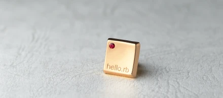 RubyKaigiのノベルティ用に、本物のRubyを使ったピンバッチをご用意しました